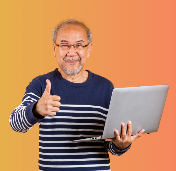 smiling old man carrying a laptop and giving a thumbs-up on an orange background