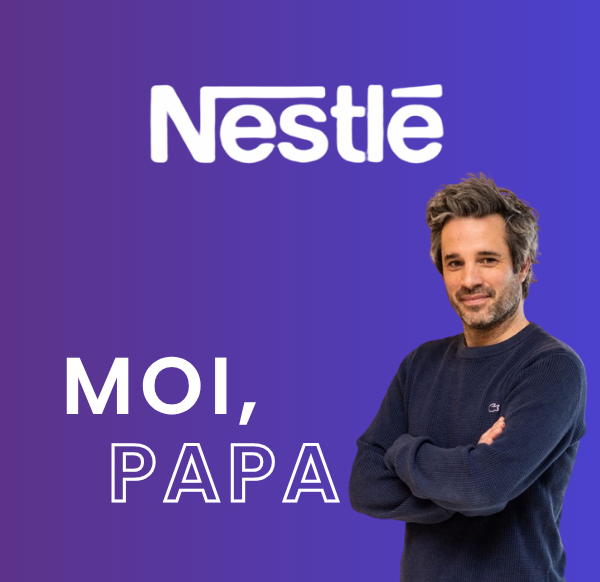 smiling man with a baby in his arms