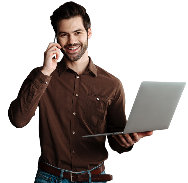 smiling man on the phone carrying a laptop