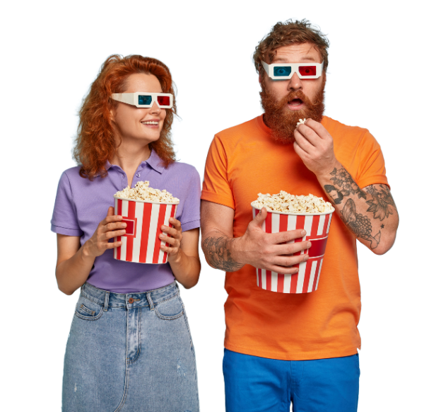 A man and a woman eating popcorn
