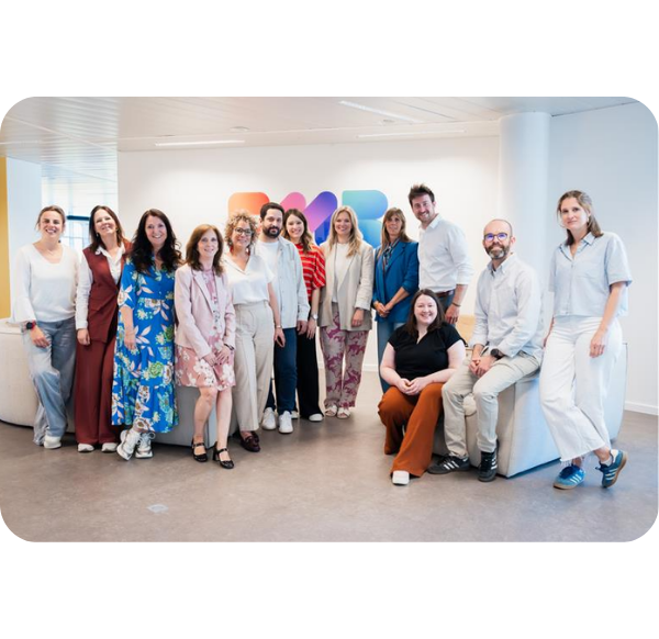 a group of people posing for a photo